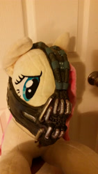 Size: 2988x5312 | Tagged: safe, artist:blackwater627, character:fluttershy, species:pegasus, species:pony, bane, ear piercing, earring, female, furrowed brow, irl, jewelry, mare, mask, necklace, photo, piercing, plushie, solo, why