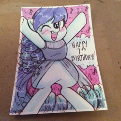 Size: 600x600 | Tagged: safe, artist:marybellamy, character:coloratura, species:pony, birthday card, commission, eye shimmer, happy, looking at you, music notes, one eye closed, rara, san diego comic con, smiling, standing, standing up, traditional art, wink