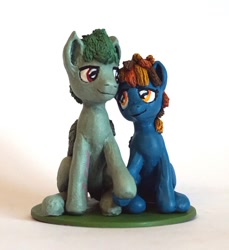 Size: 642x701 | Tagged: safe, artist:ubrosis, oc, oc:hoxie redhoof, oc:morning raindew mist, species:pegasus, species:pony, craft, female, holding hooves, looking at each other, male, mare, married couple, oc x oc, photo, sculpture, shipping, sitting, stallion