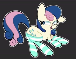 Size: 2500x1923 | Tagged: safe, artist:kindakismet, character:bon bon, character:sweetie drops, species:earth pony, species:pony, g4, bedroom eyes, black background, clothing, ear down, female, implied lesbian, implied lyrabon, implied shipping, lying down, mare, open mouth, prone, simple background, socks, solo, striped socks