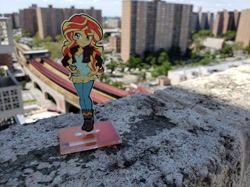 Size: 970x725 | Tagged: safe, artist:lindsay cibos, artist:mylittleties, character:sunset shimmer, equestria girls:friendship games, g4, my little pony: equestria girls, my little pony:equestria girls, boots, clothing, figure, jacket, merchandise, pants, shoes, standee