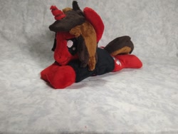 Size: 1032x774 | Tagged: safe, artist:bluedragonflyplush, species:pony, species:unicorn, all time low, beanie (plushie), clothing, commission, horn, irl, jack barakat, male, photo, plushie, ponified, prone, shirt, smiling, smirk, solo, stallion, t-shirt