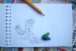 Size: 800x533 | Tagged: safe, artist:onkelscrut, character:honeysuckle, character:twilight sparkle, book, female, fourth wall, pencil, pencil drawing, photo, reading, sketch, solo, traditional art