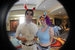Size: 1280x853 | Tagged: safe, artist:geekeryandsuch, artist:vincentninja68, character:angel bunny, character:rainbow dash, species:human, belly button, convention, convention:eqla, cosplay, eqla, equestria la, irl, irl human, midriff, muffin top, photo, sign