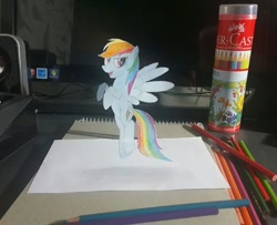 Size: 512x415 | Tagged: safe, artist:metal-jacket444, character:rainbow dash, species:pegasus, species:pony, coloring, cut paper, floating, flying, illusion, looking at you, paper, pencil drawing, real life background, realistic, traditional art