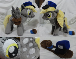 Size: 2412x1884 | Tagged: safe, artist:cryptic-enigma, character:derpy hooves, species:pegasus, species:pony, clothing, female, hat, irl, mailbag, mailmare, mare, muffin, photo, plushie, solo