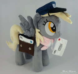 Size: 1827x1731 | Tagged: safe, artist:zizzaz, character:derpy hooves, species:pony, accessories, bags, clothing, hat, irl, letter, mailmare, photo, plushie, scarf, solo