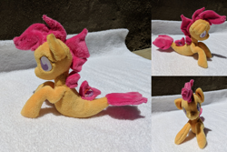 Size: 2382x1587 | Tagged: safe, artist:plushbyanto, character:scootaloo, species:seapony (g4), beanie (plushie), chibi, cute, cutealoo, female, filly, fins, front view, irl, lying down, minky, no mouth, no nostrils, no pupils, photo, plushie, profile, race swap, seaponified, seapony scootaloo, solo, species swap, tail fin, toy