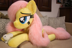 Size: 1024x683 | Tagged: safe, artist:ponimalion, character:fluttershy, species:pony, bed, female, irl, life size, pet, photo, plushie