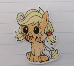 Size: 750x662 | Tagged: safe, artist:agirlwholovesmlp, character:applejack, species:earth pony, species:pony, episode:apple family reunion, g4, my little pony: friendship is magic, baby, baby pony, babyjack, cute, diaper, female, filly, foal, freckles, jackabetes, lined paper, sitting, tongue out, traditional art, younger