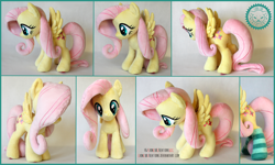 Size: 3000x1794 | Tagged: safe, artist:lioncubcreations, character:fluttershy, species:pegasus, species:pony, clothing, female, photo, plushie, socks, solo, spread wings, striped socks, wings