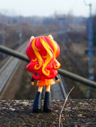 Size: 1024x1365 | Tagged: safe, artist:artofmagicpoland, character:sunset shimmer, my little pony:equestria girls, boots, clothing, doll, equestria girls minis, hair, irl, jacket, photo, ponied up, railroad, shoes, skirt, toy