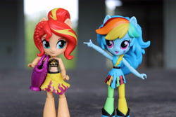 Size: 6000x4000 | Tagged: safe, artist:artofmagicpoland, character:rainbow dash, character:sunset shimmer, ship:sunsetdash, equestria girls:rainbow rocks, g4, my little pony: equestria girls, my little pony:equestria girls, bag, clothing, doll, equestria girls minis, female, lesbian, looking at you, pointing, sarong, shipping, swimsuit, toy