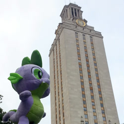 Size: 1000x1000 | Tagged: safe, artist:texasuberalles, character:spike, species:dragon, forced perspective, irl, photo, plushie, ponies around the world, solo, spike plushie, ut tower