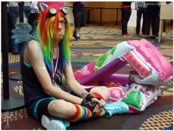 Size: 1000x750 | Tagged: safe, artist:ladyanidraws, character:rainbow dash, species:human, babscon, ball pit, clothing, convention, cosplay, dashcon, frown, irl, irl human, no fun allowed, photo, rainbow socks, socks, striped socks