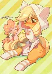 Size: 564x800 | Tagged: safe, artist:rikose, character:applejack, character:pinkie pie, applecat, blushing, cat, cat ears, cat hoodie, cat paws, cat's pajamas, clothing, costume, cute, embarrassed, eyes closed, hoodie, hoof hold, jackabetes, japanese, kigurumi, microphone, open mouth, sitting, smiling, socks, striped socks, sweat, sweatdrop, translated in the comments