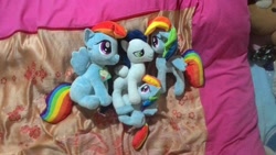 Size: 960x540 | Tagged: safe, artist:onlyfactory, character:rainbow dash, character:soarin', species:pony, bootleg, irl, photo, plushie