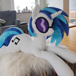 Size: 1496x1508 | Tagged: safe, artist:epicrainbowcrafts, character:dj pon-3, character:vinyl scratch, species:pony, furniture, house, irl, life size, original species, photo, plush pony, plushie, prone, realistic, solo, toy, window