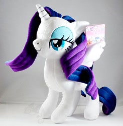 Size: 600x612 | Tagged: safe, artist:onlyfactory, character:rarity, species:alicorn, species:pony, bedroom eyes, bootleg, irl, photo, plushie, race swap, raricorn