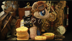 Size: 1280x720 | Tagged: safe, artist:saturnspace, character:doctor whooves, character:time turner, clockwise whooves, food, goggles, irl, photo, plushie, quiche, steampunk