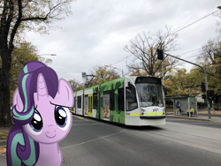 Size: 1024x768 | Tagged: safe, artist:naijiwizard, edit, character:starlight glimmer, species:pony, species:unicorn, city, cloud, cloudy, female, irl, looking at you, photo, photoshop, ponies in real life, smiling, tram