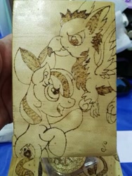 Size: 439x585 | Tagged: safe, artist:sapphire-burns-art, character:apple bloom, oc, oc:blackgryph0n, species:earth pony, species:griffon, species:pony, photo, pyrography, traditional art