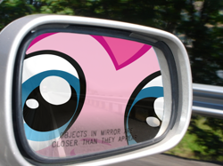 Size: 590x442 | Tagged: safe, artist:necronomiconofgod, artist:ponyweed, edit, part of a set, character:pinkie pie, car, close up series, close-up, extreme close up, fourth wall, fourth wall destruction, irl, mirror, objects in mirror are closer than they appear, parody, photo, rear view mirror, the far side