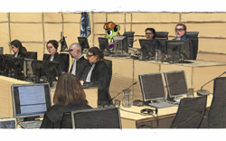 Size: 1280x800 | Tagged: safe, artist:dantheman, species:human, fanfic:chrysalis visits the hague, clothing, computer, court, courtroom, fanfic, fanfic art, flag, glass, glasses, headphones, international criminal court, judge, judges, lady justice, lawyer, microphone, pony on earth, prosecutor, robe, sketch, swift justice, table, trailer, trial, uniform