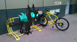 Size: 1280x714 | Tagged: safe, artist:waffleberry, species:changeling, bicycle, bike lock, blushing, lock, parking, solo, stuck, trapped