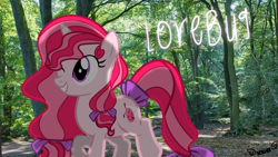 Size: 2600x1463 | Tagged: safe, artist:kiwipone, oc, oc:lovebug, species:pony, species:unicorn, art trade, blinking, bow, cute, female, forest, irl, mare, name, photo, ponies in real life, signature, smiling, solo, trotting