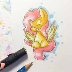 Size: 605x604 | Tagged: safe, artist:y0wai, character:fluttershy, cute, eyes closed, female, open mouth, pencil, prone, smiling, solo, spread wings, traditional art, wings