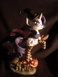 Size: 1024x1365 | Tagged: safe, artist:alexcroft1991, character:rarity, broom, clothing, costume, craft, fake cutie mark, flying, flying broomstick, hat, jack-o-lantern, looking back, nightmare night costume, pumpkin, sculpture, smiling, socks, striped socks, witch, witch hat