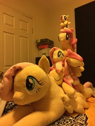 Size: 2448x3264 | Tagged: safe, artist:janellesplushies, character:fluttershy, irl, multeity, photo, plushie, pony pile, so much flutter