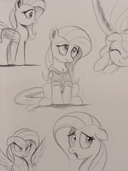 Size: 2000x2667 | Tagged: safe, artist:ncmares, character:fluttershy, species:pegasus, species:pony, g4, angry, clothing, eyes closed, floppy ears, glare, monochrome, nose wrinkle, open mouth, shirt, sketch, smiling, solo