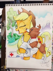 Size: 768x1024 | Tagged: safe, artist:andypriceart, character:applejack, character:winona, bandage, clothing, first aid, photo, sketchbook, traditional art, veterinarian