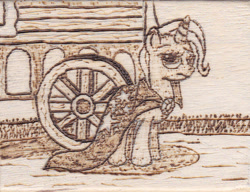 Size: 778x597 | Tagged: safe, artist:malte279, character:trixie, cape, caravan, clothing, pyrography, solo, traditional art, trixie's cape, trixie's wagon, wagon, wheel