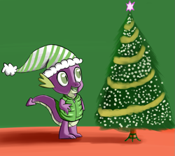Size: 881x785 | Tagged: safe, artist:itsthinking, idw, character:spike, species:dragon, episode:hearth's warming eve, g4, my little pony: friendship is magic, christmas, christmas tree, clothing, green background, hat, holiday, jacket, open mouth, santa hat, simple background, smiling, solo, tree