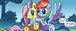 Size: 1440x600 | Tagged: safe, artist:pencils, edit, idw, official comic, character:fluttershy, character:rainbow dash, species:pegasus, species:pony, ship:flutterdash, bipedal, cute, dialogue, duo, eye contact, female, friendshipping, grin, hair over one eye, hug, looking at each other, mare, petting, raised hoof, shipping fuel, smiling, speech bubble, spread wings, squee, winghug, wings