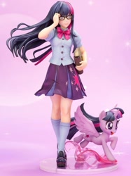 Size: 562x750 | Tagged: safe, kotobukiya, character:twilight sparkle, character:twilight sparkle (alicorn), species:alicorn, species:human, species:pony, my little pony:equestria girls, book, clothing, doll, figure, glasses, human coloration, human ponidox, humanized, i can't believe it's not sci-twi, irl, photo, pleated skirt, self ponidox, shoes, skirt, socks, toy, twilight's professional glasses