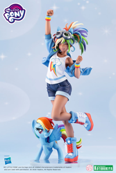 Size: 1200x1799 | Tagged: safe, kotobukiya, character:rainbow dash, species:human, species:pegasus, species:pony, clothing, dark skin, denim shorts, figurine, goggles, goggles on head, human ponidox, humanized, legs, merchandise, moe, one eye closed, pose, raised hoof, self ponidox, sexy, shorts, smiling, spread wings, sultry pose, tank top, tomboy, wings, wink, winking at you