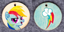 Size: 1014x507 | Tagged: safe, artist:malte279, character:rainbow dash, species:pony, craft, cutie mark, jewelry, pendant, traditional art, wood