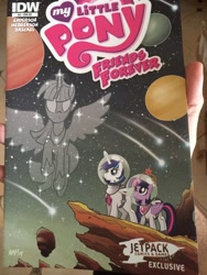 Size: 768x1024 | Tagged: safe, artist:tonyfleecs, idw, character:shining armor, character:twilight sparkle, character:twilight sparkle (alicorn), species:alicorn, species:pony, cover, female, jetpack, jetpack comics, mare, planet, ponies in space, space, space suit