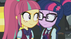 Size: 893x500 | Tagged: safe, screencap, character:sour sweet, character:twilight sparkle, character:twilight sparkle (scitwi), species:eqg human, equestria girls:friendship games, g4, my little pony:equestria girls, bow tie, discovery family logo, eye contact, glasses, ponytail