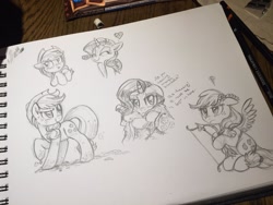 Size: 1200x900 | Tagged: safe, artist:whitediamonds, character:applejack, character:rarity, ship:rarijack, arrow, blanket, bow (weapon), bow and arrow, cupid, female, heart, irl, lesbian, mud, muddy, photo, scrunchy face, shipping, sketch, sketchbook, traditional art