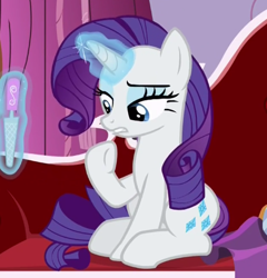 Size: 419x436 | Tagged: safe, screencap, character:rarity, species:pony, species:unicorn, episode:p.p.o.v. (pony point of view), g4, my little pony: friendship is magic, cropped, fainting couch, female, lidded eyes, magic, magic aura, mare, nail file, raised hoof, sitting, solo, telekinesis