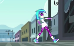 Size: 776x480 | Tagged: safe, screencap, character:dj pon-3, character:vinyl scratch, episode:music to my ears, equestria girls:rainbow rocks, g4, my little pony:equestria girls, building, canterlot city, clothing, headphones, leggings, shoes, short, skirt, sneakers, solo, street, sunglasses, walking