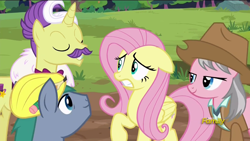 Size: 1920x1080 | Tagged: safe, screencap, character:dandy grandeur, character:fluttershy, character:hard hat, character:wrangler, species:pony, episode:fluttershy leans in, g4, my little pony: friendship is magic, clothing, discovery family logo, hard hat, hat