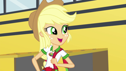 Size: 1280x720 | Tagged: safe, screencap, character:applejack, equestria girls:legend of everfree, g4, my little pony:equestria girls, camp everfree outfits, clothing, cowboy hat, cute, duffle bag, female, freckles, hat, open mouth, school bus, solo, stetson