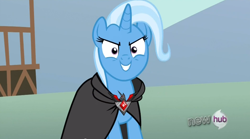 Size: 846x469 | Tagged: safe, screencap, character:trixie, species:pony, episode:magic duel, g4, my little pony: friendship is magic, alicorn amulet, hub logo, hubble, solo