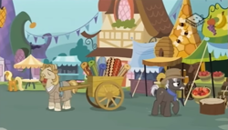 Size: 825x472 | Tagged: safe, screencap, character:burnt oak, character:jeff letrotski, species:earth pony, species:pony, episode:the perfect pear, g4, my little pony: friendship is magic, apple, bandana, beard, cart, clothing, cowboy hat, facial hair, food, hat, male, market, moustache, rug, stallion